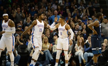 Dec 1, 2017; Oklahoma City, OK, USA; Oklahoma City Thunder forward Carmelo Anthony (7) forward Paul George (13) and guard Russell Westbrook (0) react after a play against the Minnesota Timberwolves at Chesapeake Energy Arena. Mandatory Credit: Mark D. Smith-USA TODAY Sports