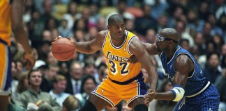 Los Angeles, CA, USA; Orlando Magic forward Horace Grant defends Los Angeles Lakers guard Magic Johnson in a game at the Forum in Los Angeles, CA. Mandatory Credit-Matt A. Brown/Icon Sportswire